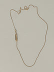 Noted Necklace