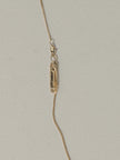 Noted Necklace