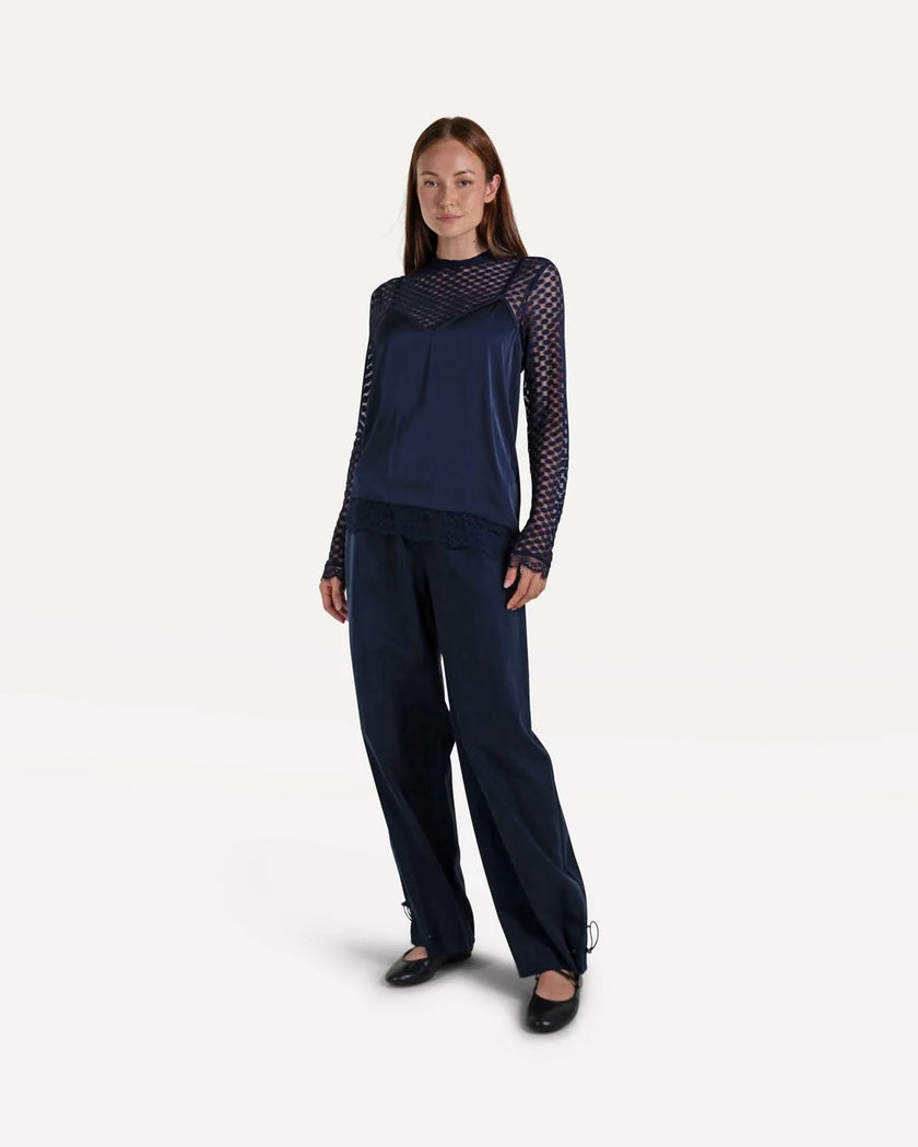 Pearly Top in Night Sky